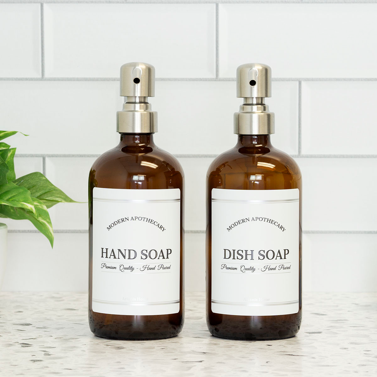 amber hands dishes pump dispenser set with stainless steel pumps for kitchen sink.