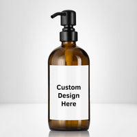 Elegant amber glass 16 oz boston round bottle personalized customized with waterproof label, printed on demand with choice of pumps including stainless steel for kitchen, amenities, hospitality, businesses, bathrooms.