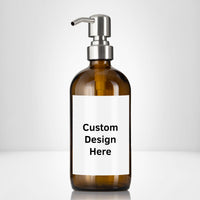 Elegant amber glass 16 oz boston round bottle personalized customized with waterproof label, printed on demand with choice of pumps including stainless steel for kitchen, amenities, hospitality, businesses, bathrooms.