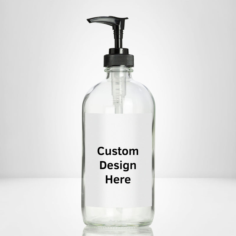 Elegant clear glass 16 oz boston round bottle personalized customized with waterproof label, printed on demand with choice of pumps including stainless steel for kitchen, amenities, hospitality, businesses, bathrooms.