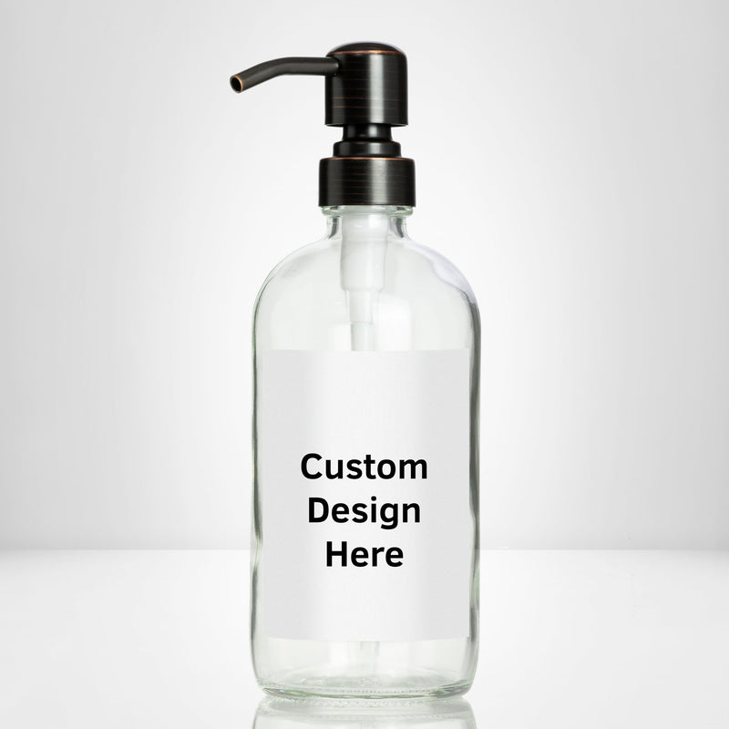 Elegant clear glass 16 oz boston round bottle personalized customized with waterproof label, printed on demand with choice of pumps including stainless steel for kitchen, amenities, hospitality, businesses, bathrooms.