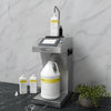 Hotel Emporium LiquiFill Hospitality Liquid Refilling Machine, Single Model filling a bottle