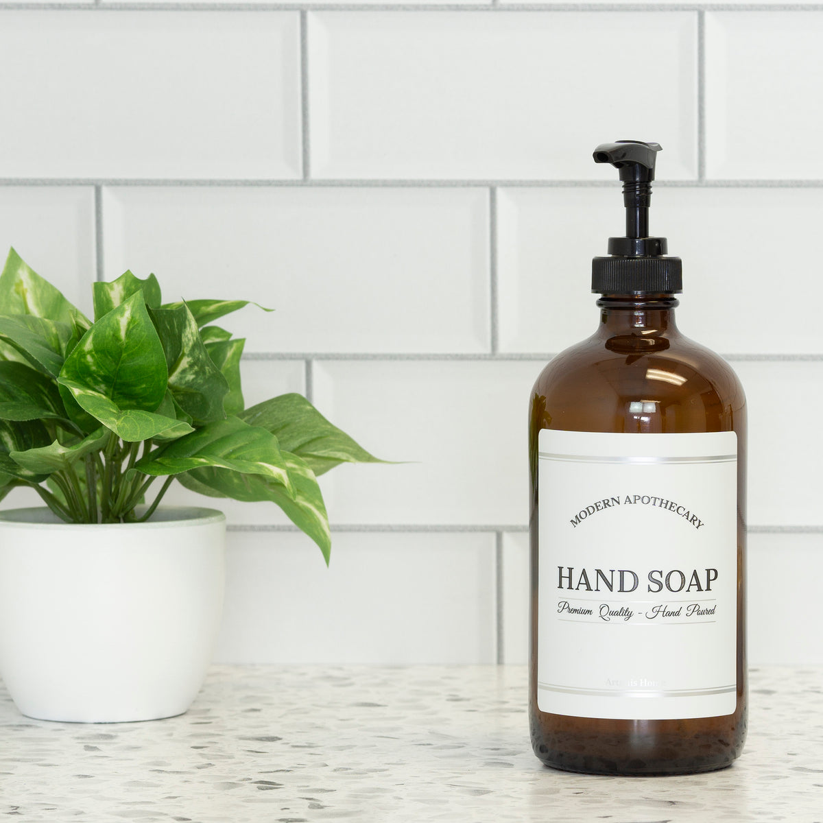 Hand soap dispenser with black plastic pump