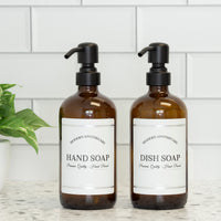 Amber glass 16oz Boston round bottles with Modern Apothecary labels for hand soap and dish soap with 304 grade black steel pumps. 