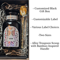 Miron apothecary jar with white holographic custom label, nestled in a black gift box with alloy teaspoon scoop. Bullet point describe the features.