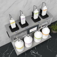 LIQUIFILL station filling various bottles from four gallon jugs on a gray marble surface, top view