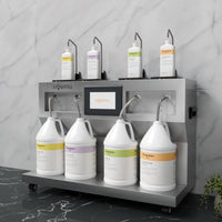 LIQUIFILL station filling various bottles from four gallon jugs on a gray marble surface.